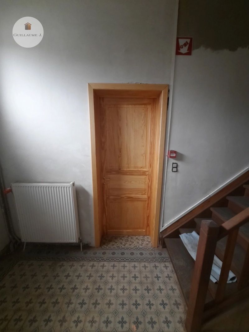 Porte intérieure en bois à panneaux – Guillaume Menuiserie