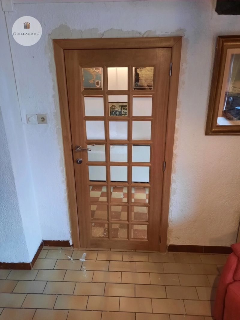 Porte intérieure vitrée à petits carreaux – Guillaume Menuiserie