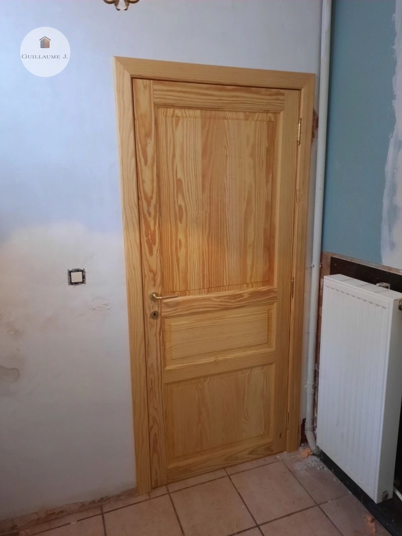 Porte intérieure en bois à panneaux – Guillaume Menuiserie