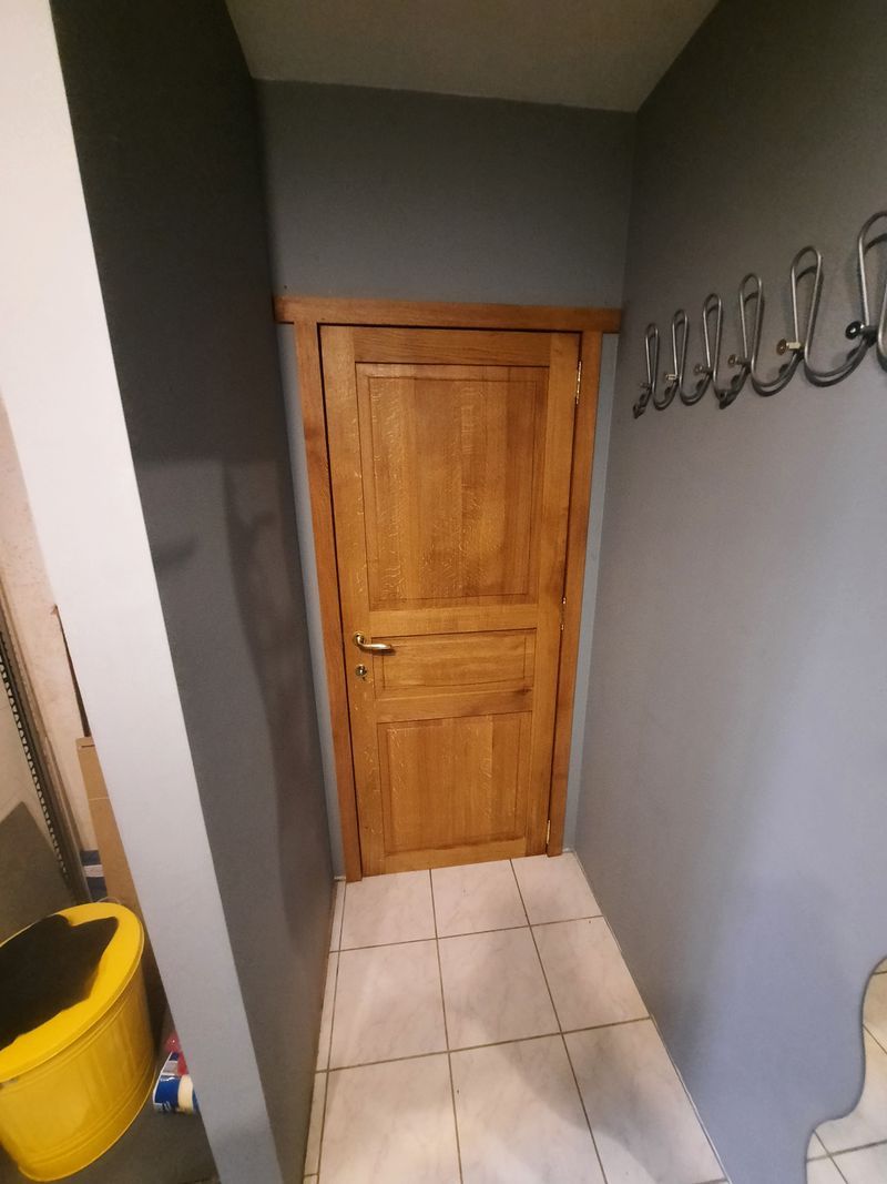 Porte intérieure en bois à panneaux – Guillaume Menuiserie